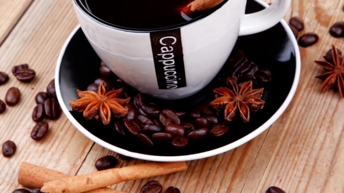 stock footage dessert hot black coffee and chocolate cake with cinnamon coffee beans and anise star x 700x393 Капучино   cappuccino